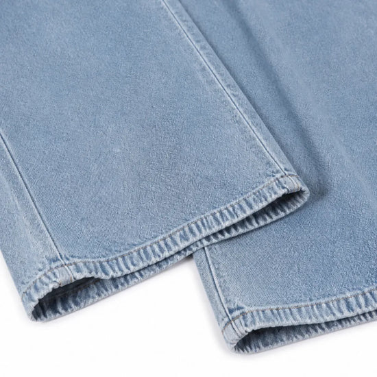 Ellora – Wide leg denim jumpsuit with button front and pockets