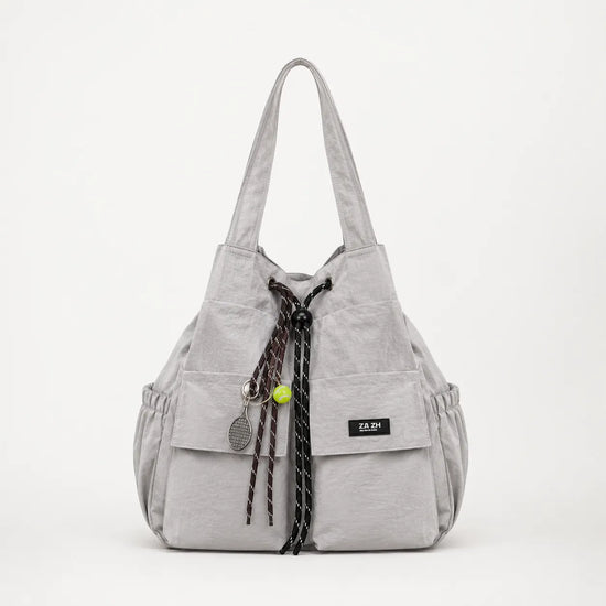 Carryall – Convertible Drawstring Canvas Tote Backpack with Cargo Pockets