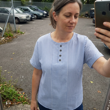 Customer photo of the striped button top