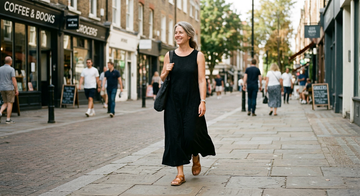 Black maxi dress with tan sandals