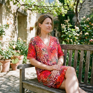 Summer midi dress on a garden bench